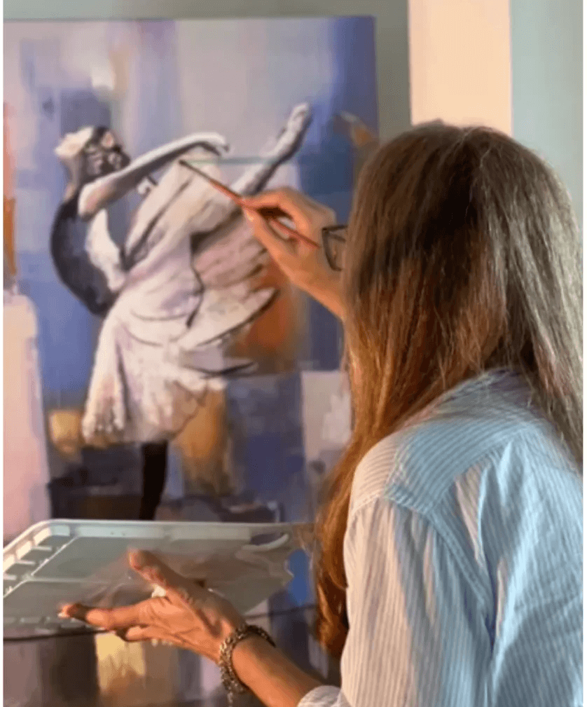 Pomm Hepner Pomm Hepner is drawing a painting.